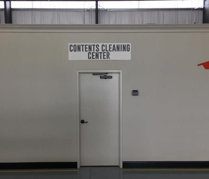 Closed room labeled "contents cleaning center."